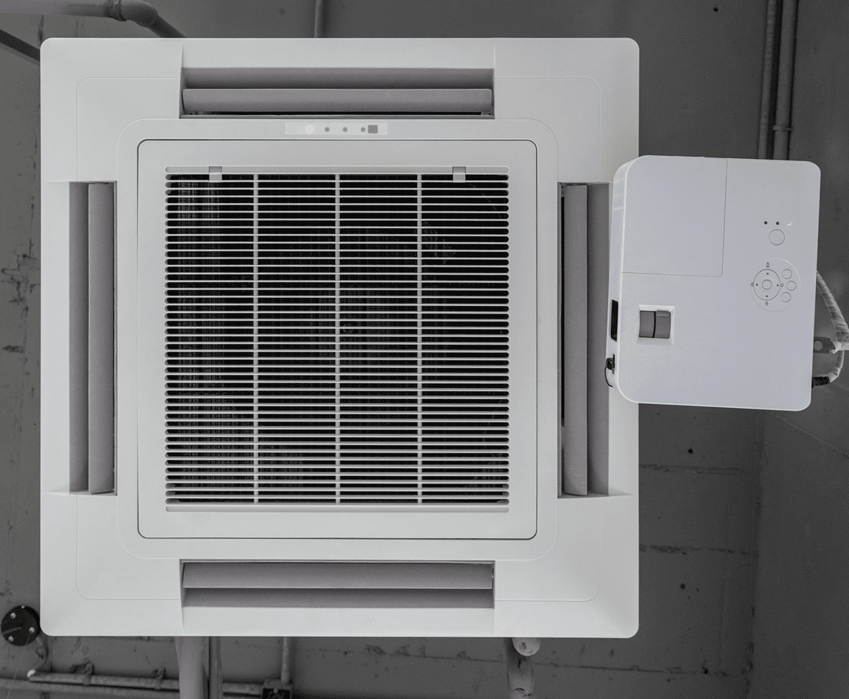 Ceiling air conditioning unit with vents